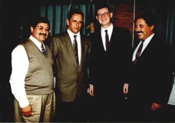 Quatro integrantes da ARH Serrana lado a lado em um evento